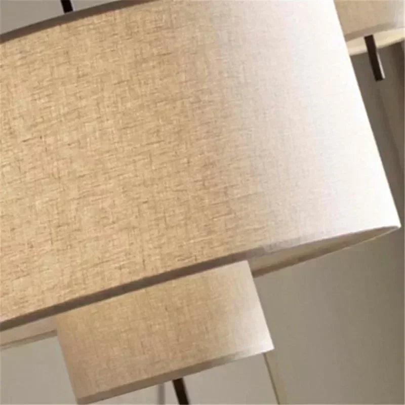 Close-up of a beige lampshade with a blurred background
